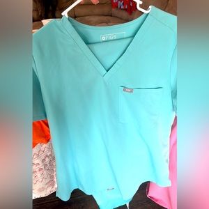 FIGS Scrub set light teal blue aqua color.